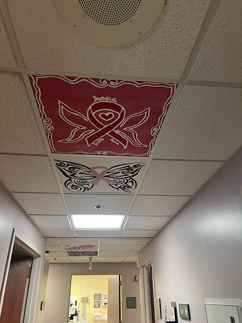 Beautiful ceiling tiles painted by students