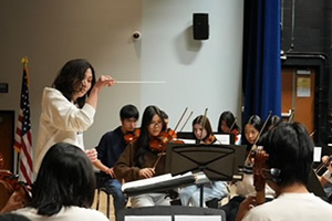 Conductor in front of orchestra